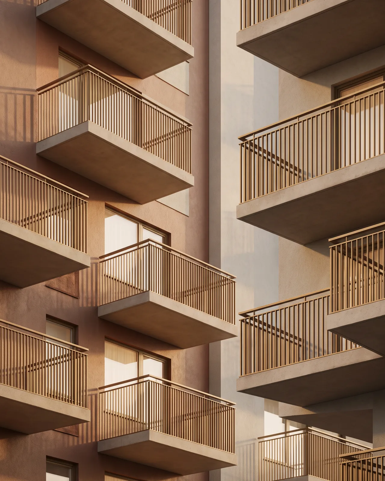 A residential apartment facade in warm afternoon light